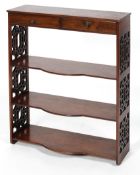 A set of 19th century mahogany hanging shelves with Chinese-style fretwork to the side,