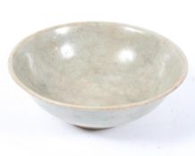 A Chinese celadon glazed bowl, of flared form,