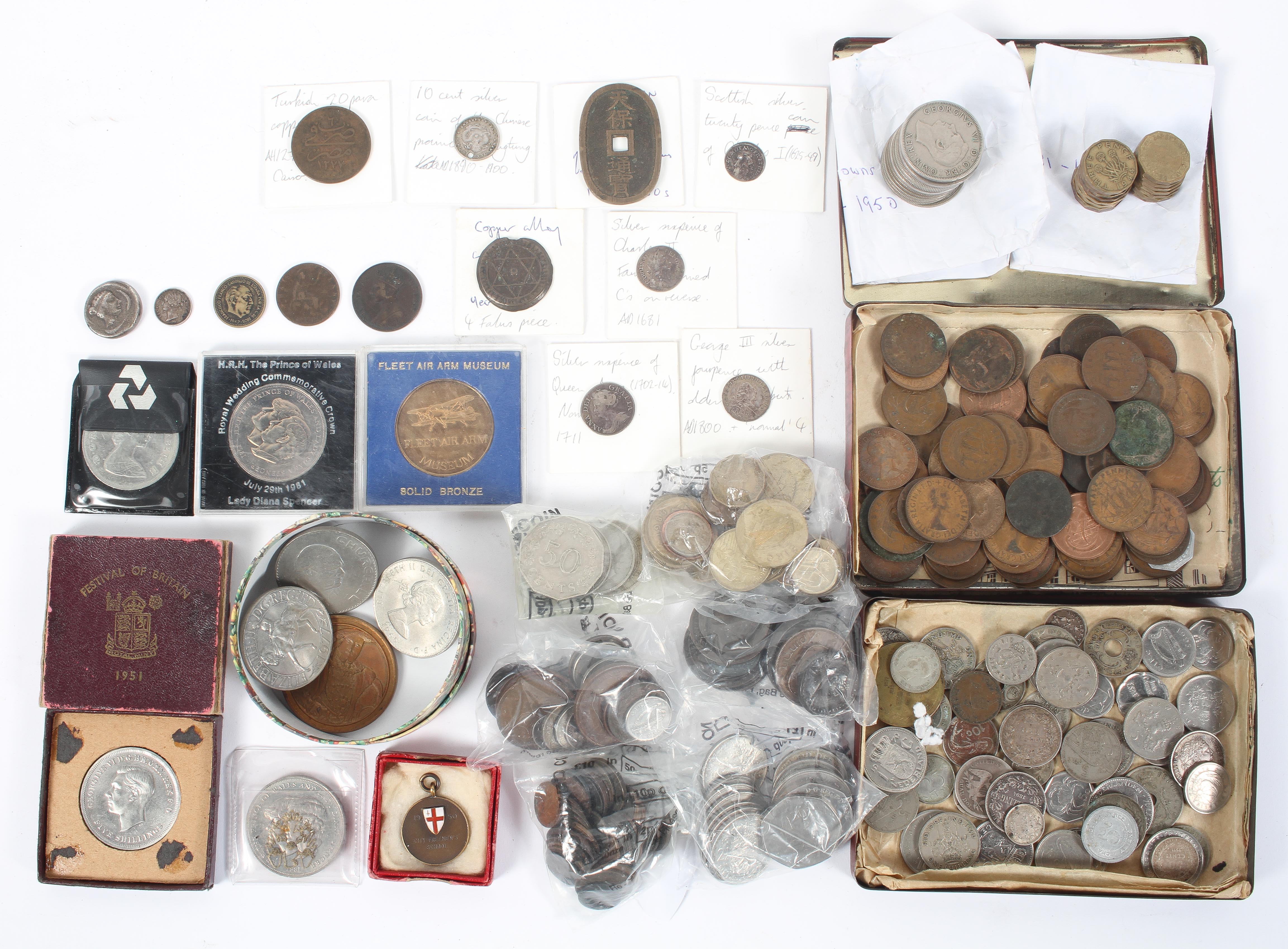 A collection of coins, mainly pre decimal, including Charles I and II,