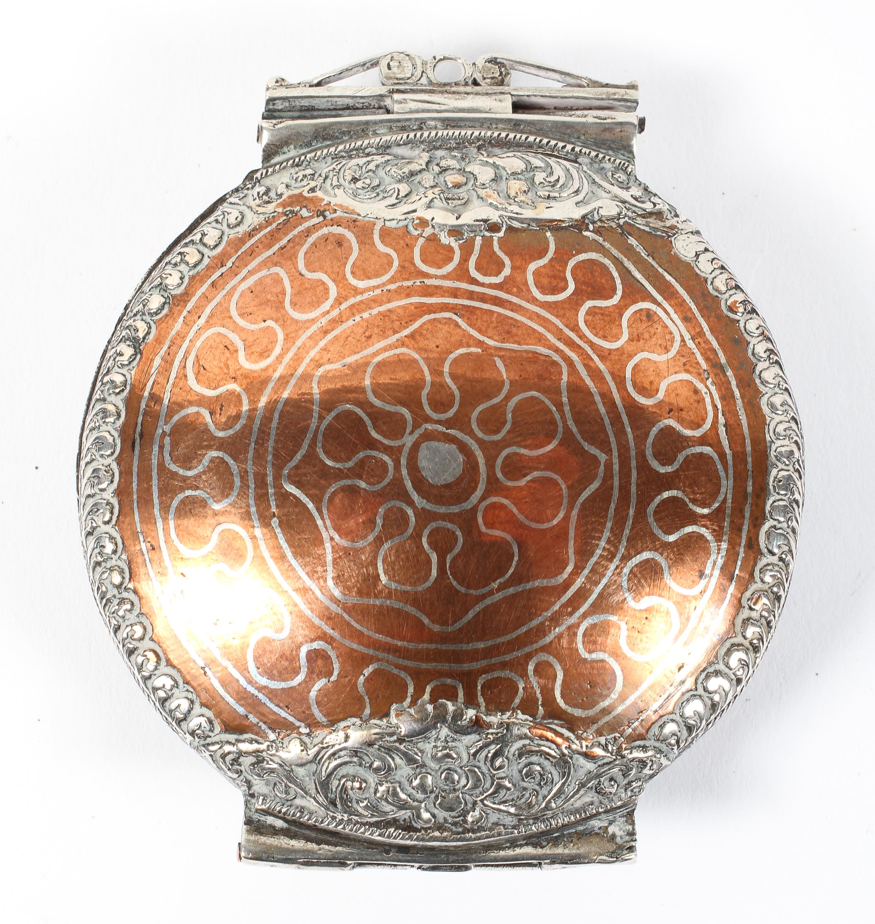 A late 17th/early 18th Century copper and steel hinged opium snuff box,