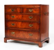 A reproduction mahogany George III style bachelor's chest by Brights of Nettlebed,