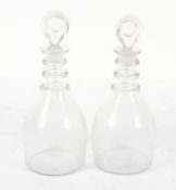 A pair of Georgian glass decanters and stoppers,