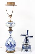 A vintage Delft Blauw hand painted night light modelled as a windmill,