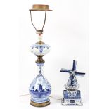 A vintage Delft Blauw hand painted night light modelled as a windmill,