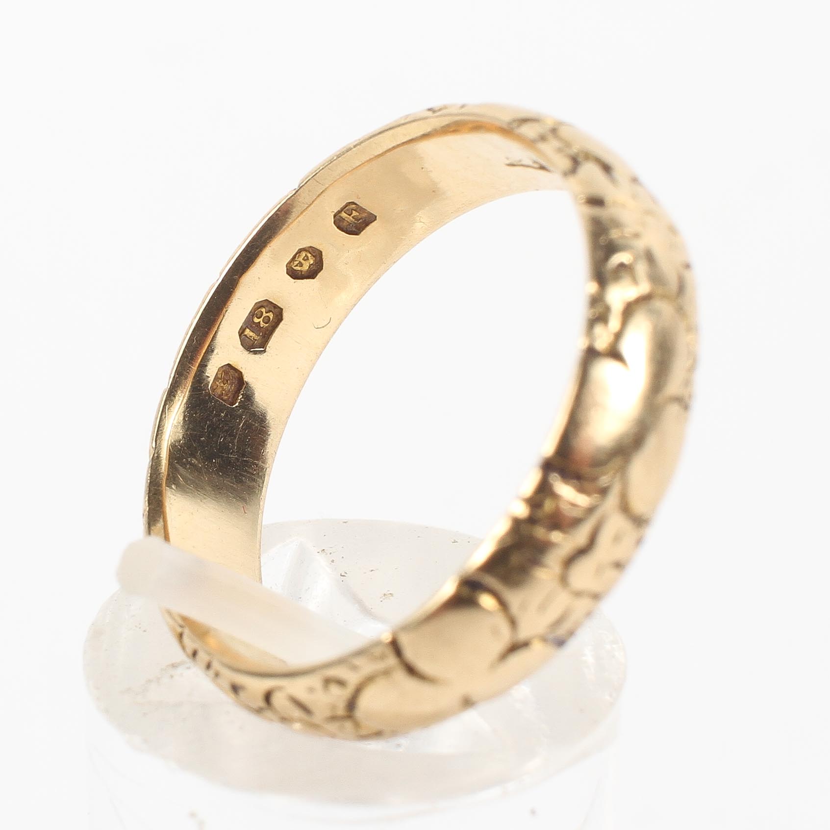 A yellow metal D shape 5mm wedding ring with cherry blossom design (worn) Hallmarked 18ct gold, - Image 4 of 4