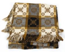 A Welsh tapestry blanket, in brown, black, cream and yellow,