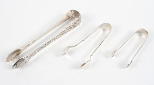 Three pairs of silver sugar tongs,