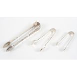 Three pairs of silver sugar tongs,