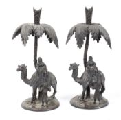 A pair of silver plated candlesticks, late 19th century, modelled as a camel,