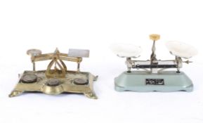 A brass set of postal scales, with cast foliate decoration,