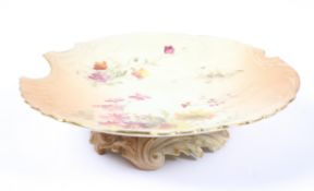 A 19th Century Royal Worcester dessert or cabinet plate, of Rococo outline with gilt moulded rim,