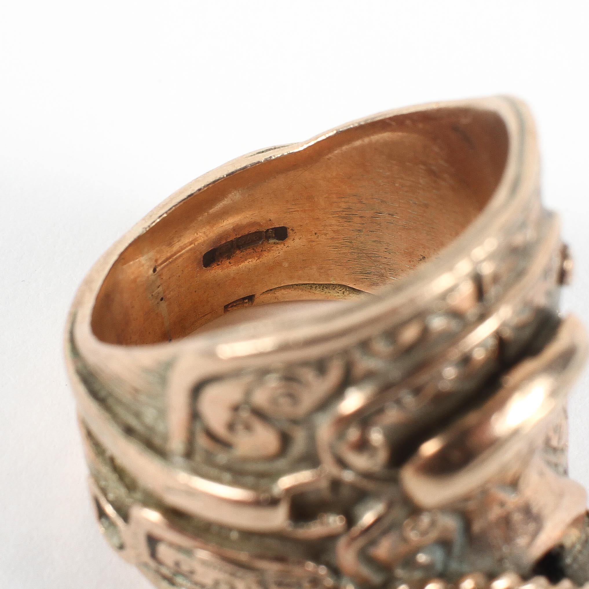 A large yellow metal abstract ring of horseback design. Hallmarked 9ct gold, Birmingham. - Image 3 of 3