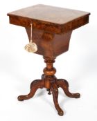 A Victorian burr walnut sewing table, the rectangular hinged top inlaid with floral marquetry,