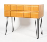 A plywood and birch veneer 1970's set of library drawers, with five rows of two drawers,