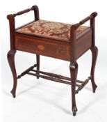 An Edwardian mahogany and inlaid piano stool,