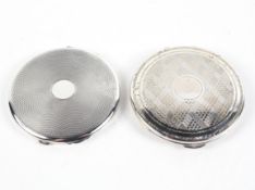 Two silver compacts, hallmarked Birmingham 1935, maker C & N and London 1949, maker KLd,