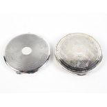 Two silver compacts, hallmarked Birmingham 1935, maker C & N and London 1949, maker KLd,