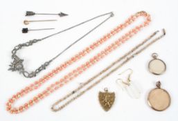 A collection of costume jewellery to include necklaces, stick pins, earrings, lockets and pendants.