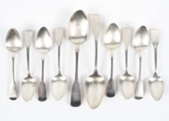 A collection of Georgian Irish spoons, including two tablespoons and eight dessert spoons,