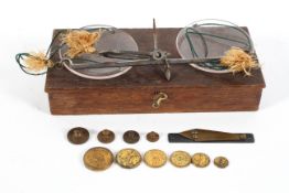 A set of apothecary beam scales, boxed, with Scruple, Drachms and other weights, in oak box,