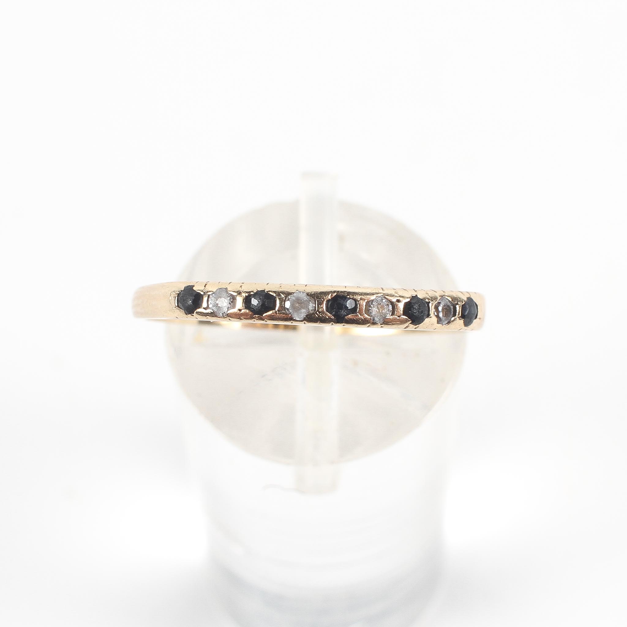 A yellow metal ring set with sapphires and cubic zirconia. Hallmarked 9ct gold, Birmingham. - Image 2 of 4