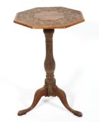 An Arts and Crafts style walnut occasional table,