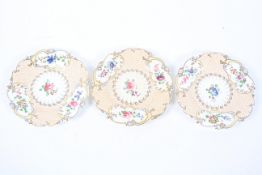 Three Staffordshire porcelain dessert plates, mid-19th century, moulded and painted with flowers,