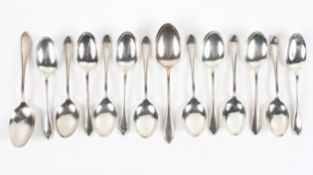 A set of twelve solid silver dessert spoons by Viners, Sandringham pattern,