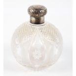 An Edwardian silver mounted cut glass scent bottle of globular form,