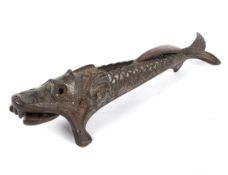 A novelty cast iron nutcracker in the form of a fish,