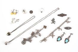 A collection of jewellery to include: Two silver bracelet with assorted charms; Two loose charms;