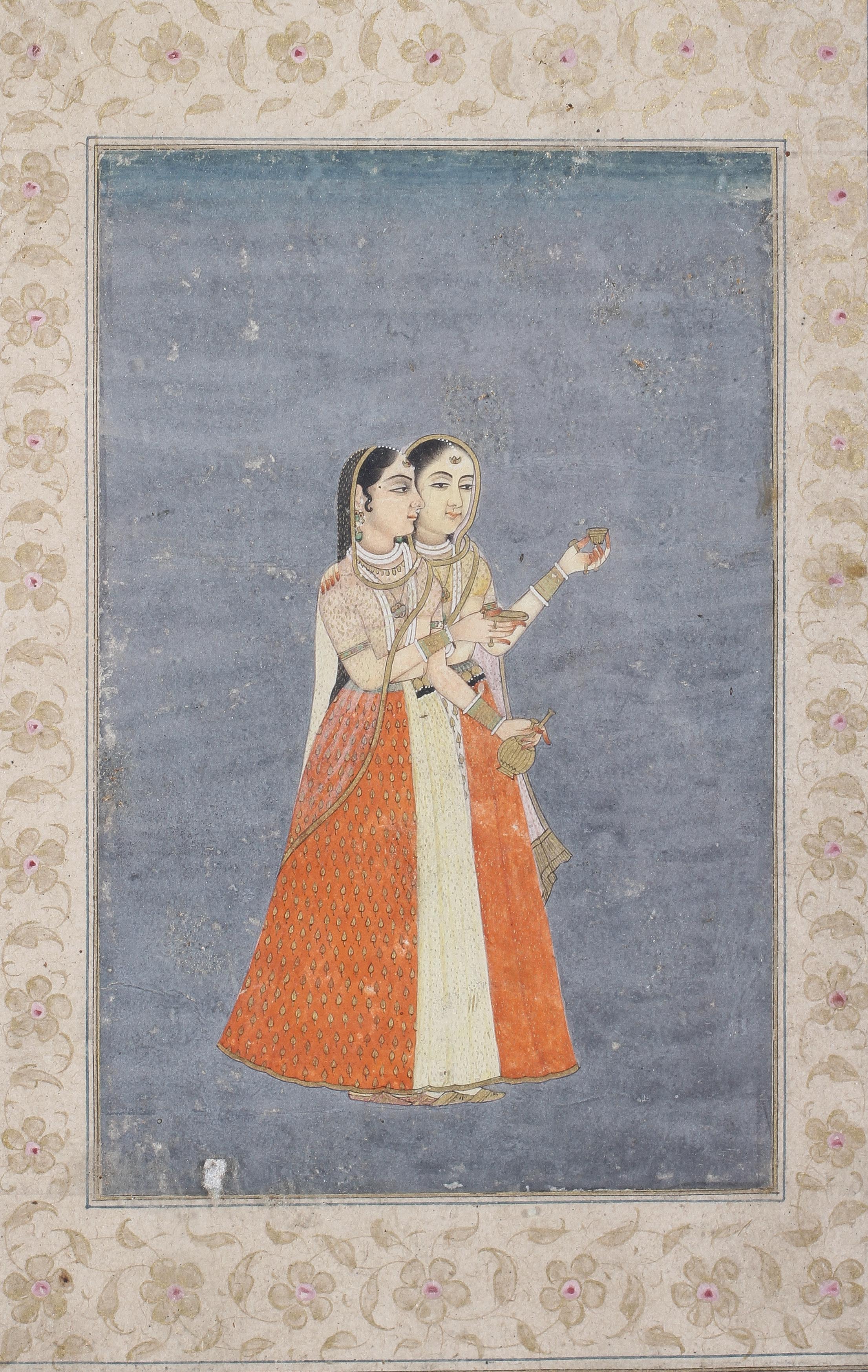 Indian miniature, Two well dressed ladies inside a floral border, gouache and gilt, - Image 3 of 3