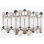 A set of six Edwardian silver teaspoons with highly detailed floral decoration,