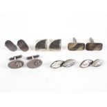 A collection of five pairs of cufflinks of variable designs. Gross weight: 52.4 grams