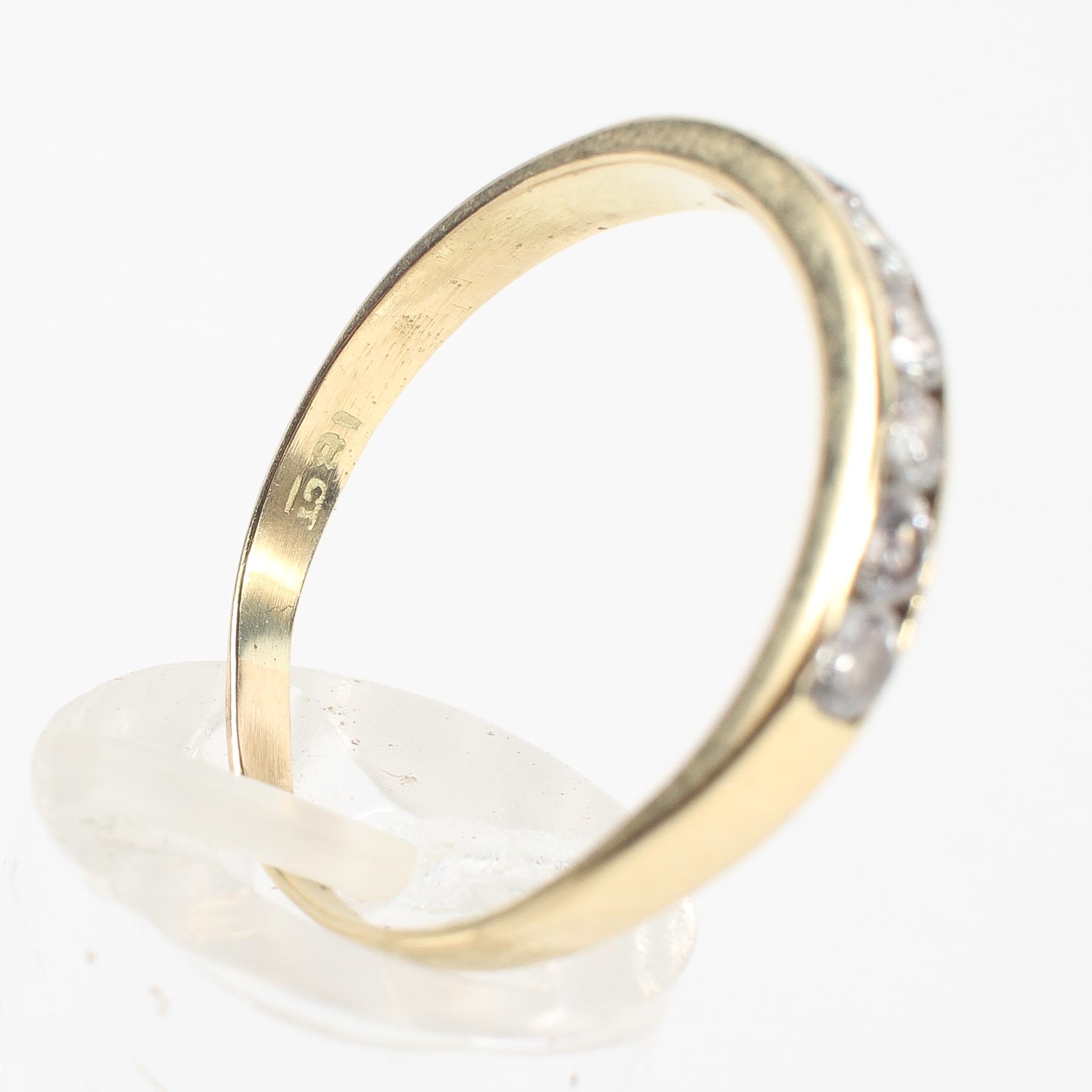 A yellow metal half hoop ring set with seven round brilliant cut diamonds - Image 4 of 4