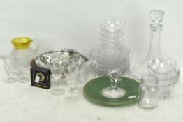 A quantity of contemporary glassware, comprising a set of eight dessert bowls and small plates,