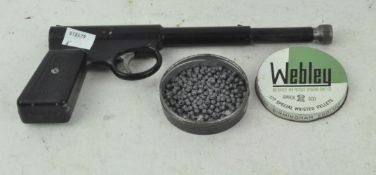 A vintage .177 The Gat air pistol complete with tin of pellets