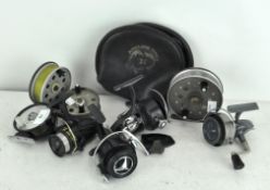 Eight fishing reels, to include a Boyztoys S71000,