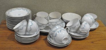 An extensive early 20th century porcelain tea set,