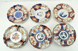 A collection of six Japanese Imari plates, in blue,