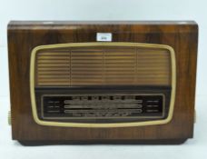 A vintage wooden veneer cased "Regentone" radio,