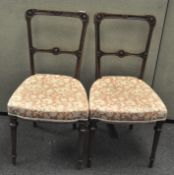 A pair of late 19th century Mahogany chairs, upholstered seat,