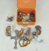 A selection of vintage costume jewellery, to include brooches,