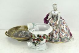 A large porcelain figure depicting a Royal,