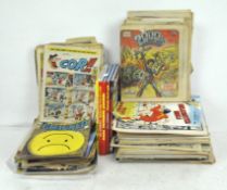 A large collection of comics, including Battle, 12000AD,