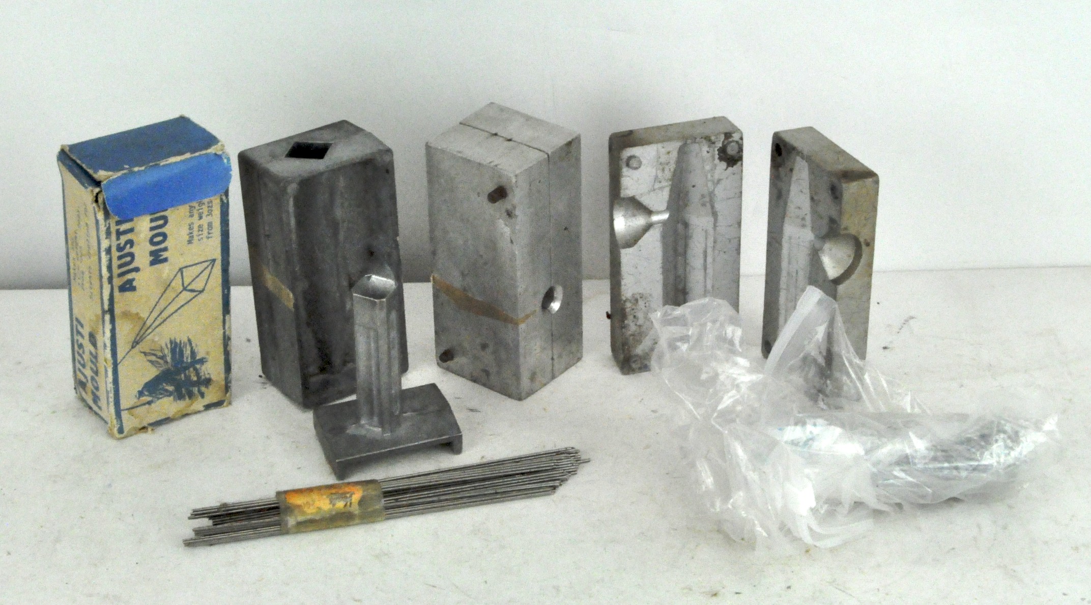 Three sea fishing lead moulds