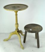 A white painted wine table of circular form, on tripod base, 49cm high,