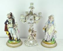 A pair of ceramic late 19th/early 20th century continental depicting a gentleman and lady