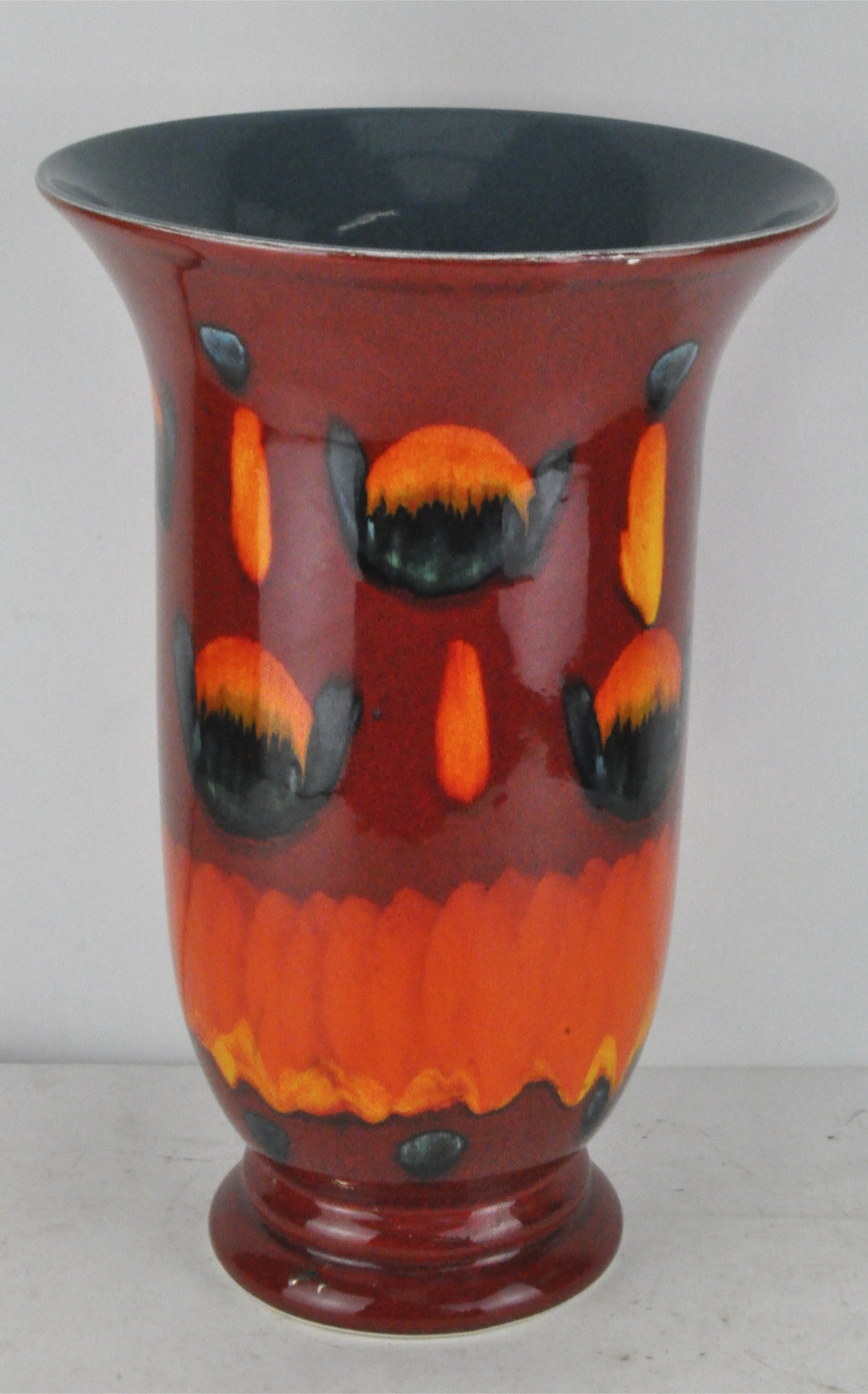 A large Poole pottery "Volcano" pattern vase, with flared rim,