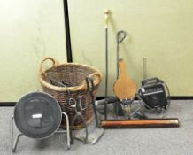 A collection of fireside equipment, including bellows,
